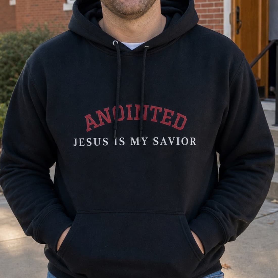 Close-up of the black My Jesus hoodie graphic during unboxing