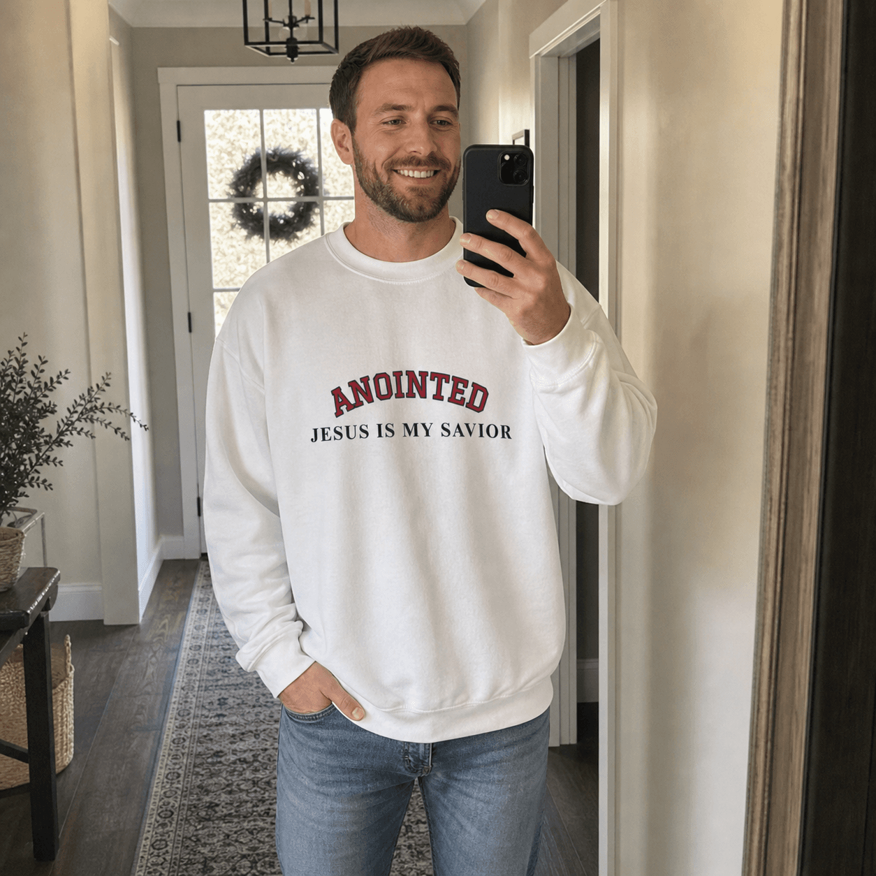 Customer mirror selfie wearing the white My Jesus sweatshirt
